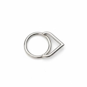 Clicker plateado con detalle "V"