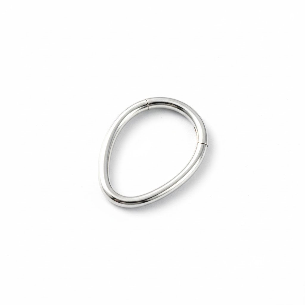 Clicker plateado forma ovalo