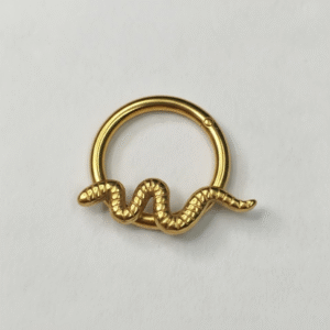 Clicker dorado con serpiente